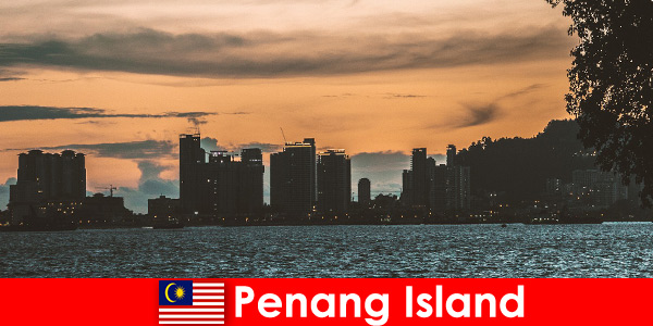 Tatilciler saf rahatlama için Hedef Penang Adası Malezya